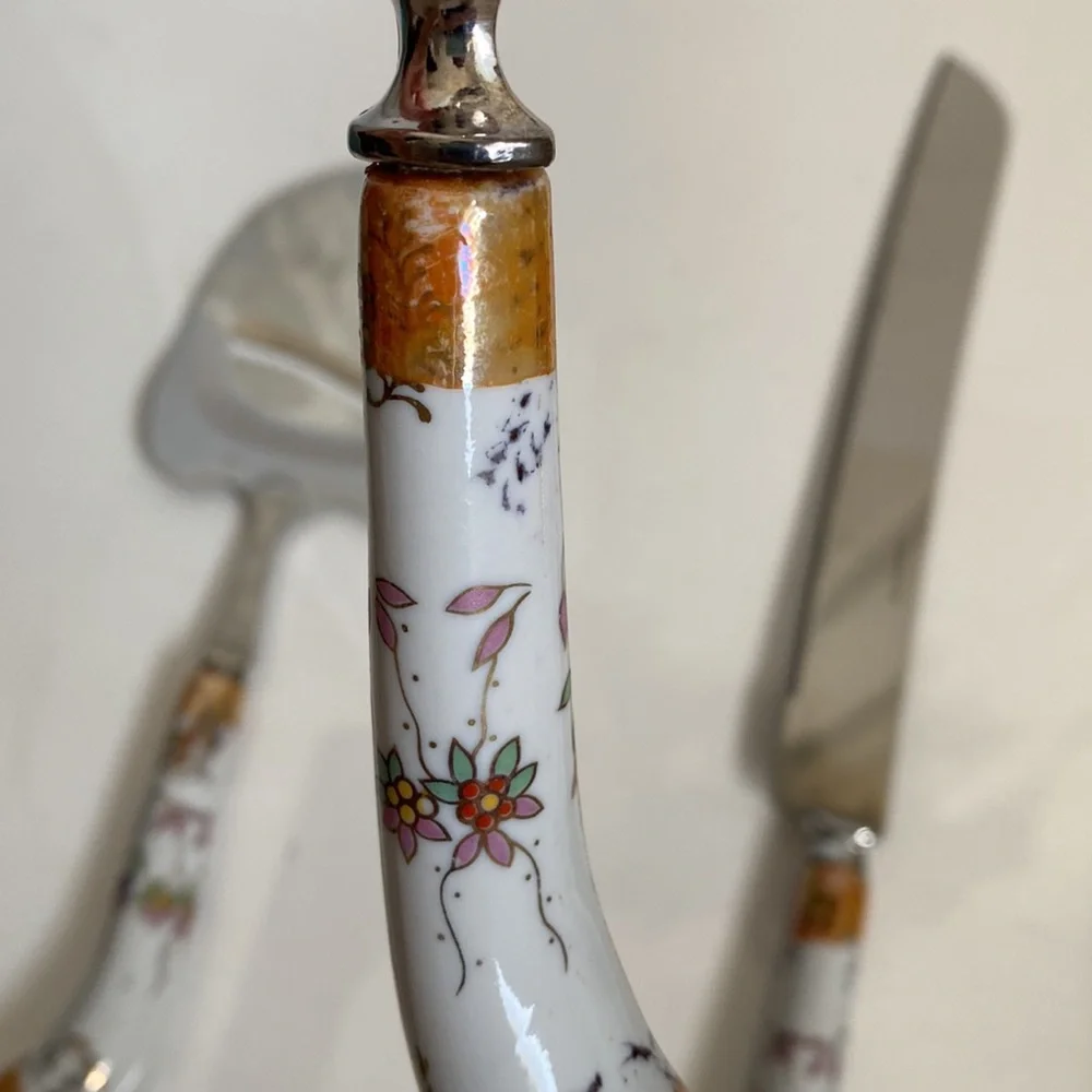 Lovely set of vintage serve ware with floral porcelain handles