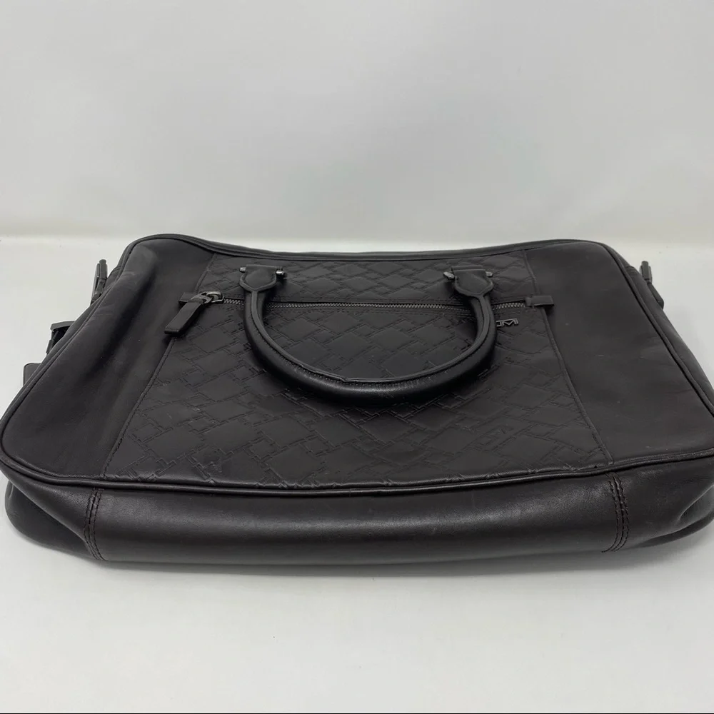 Tumi brown leather