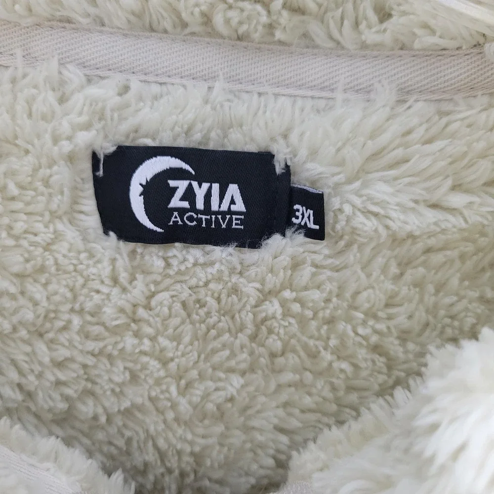 ZYIA cream zip