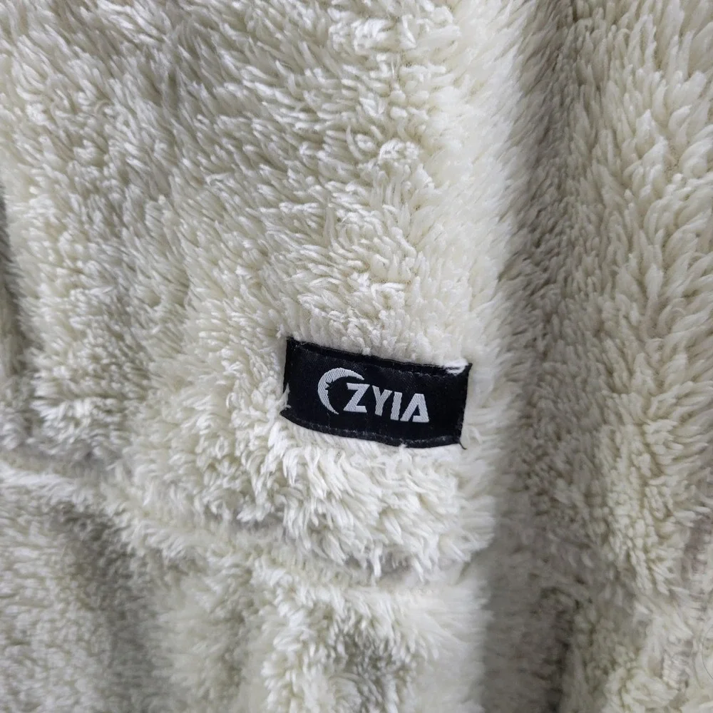 ZYIA cream zip