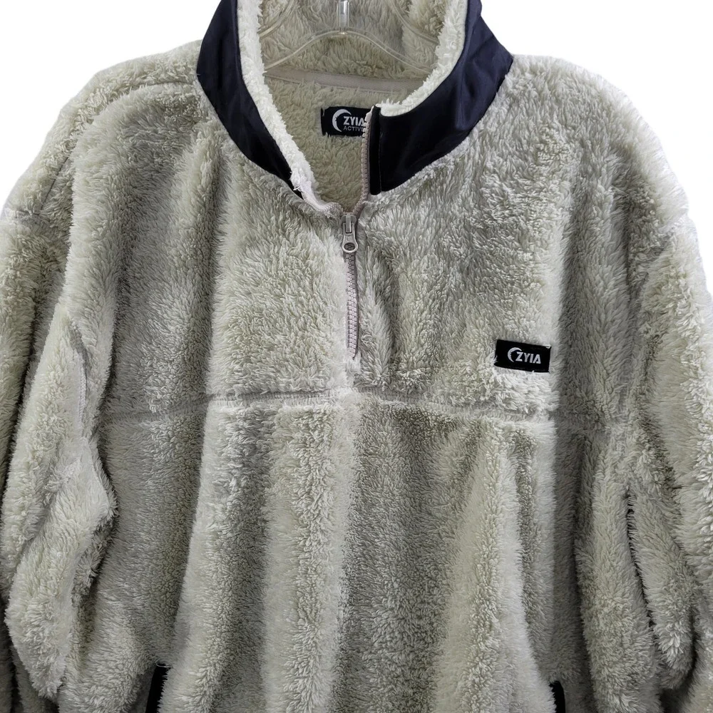 ZYIA cream zip