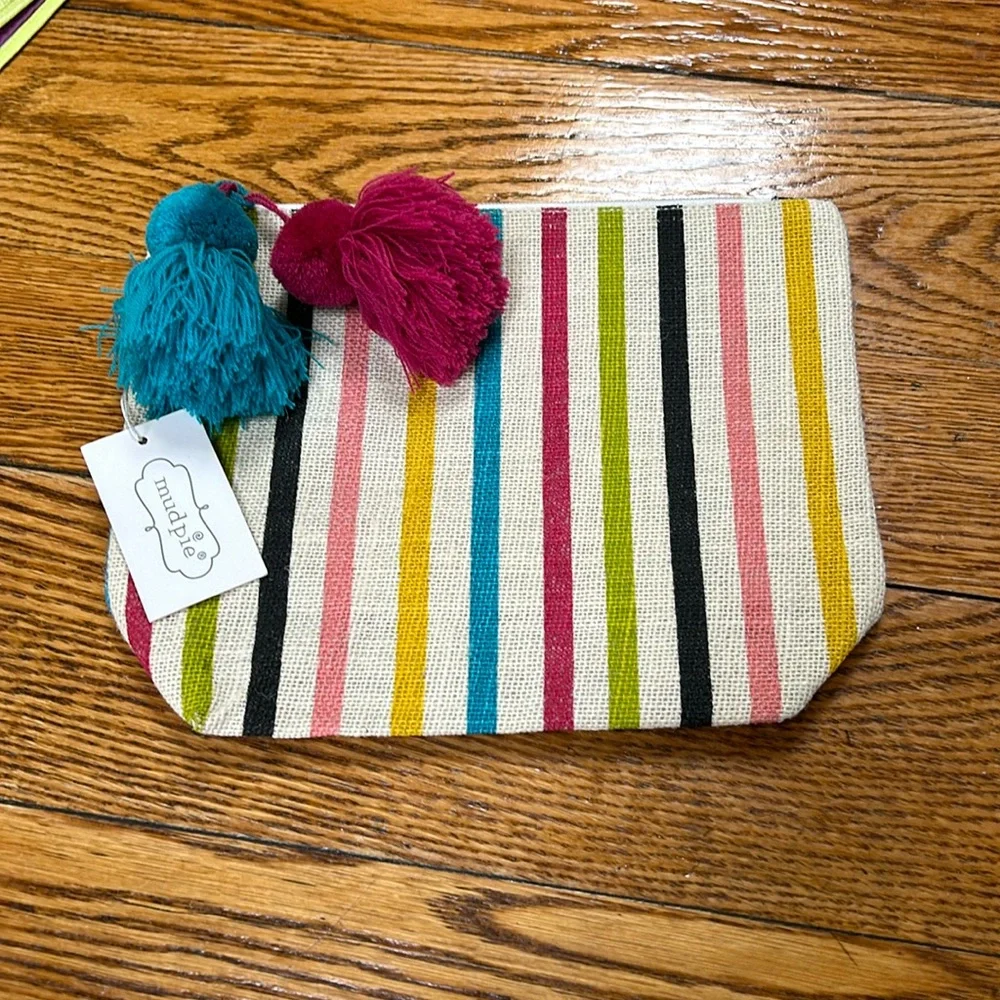 Mud Pie new with tag striped jute bag. Green, pink, black gold. Pompom tassles.
