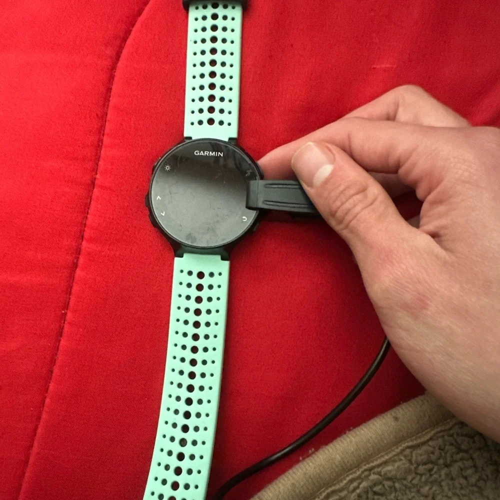 Garmin Black and Green Wearable Charger with Sporty Design