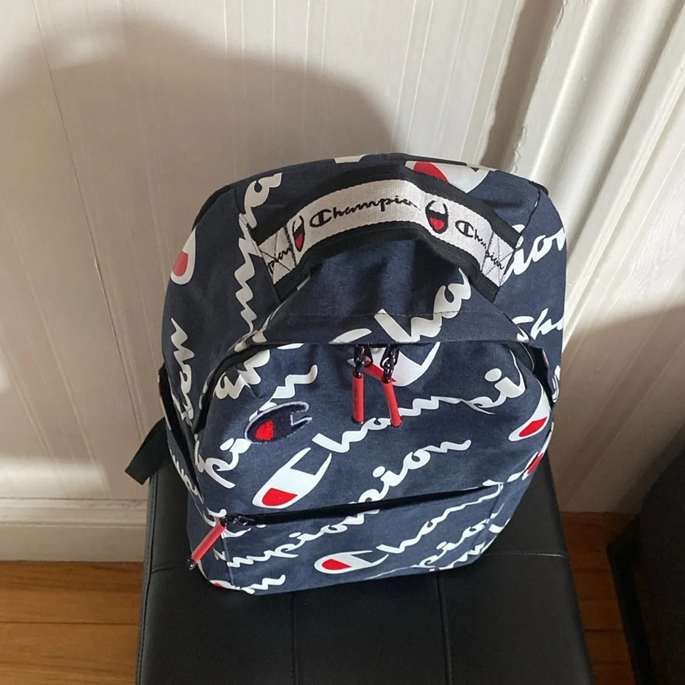 Champion blue,navy Travel Backpack,work bag, with Red Accents