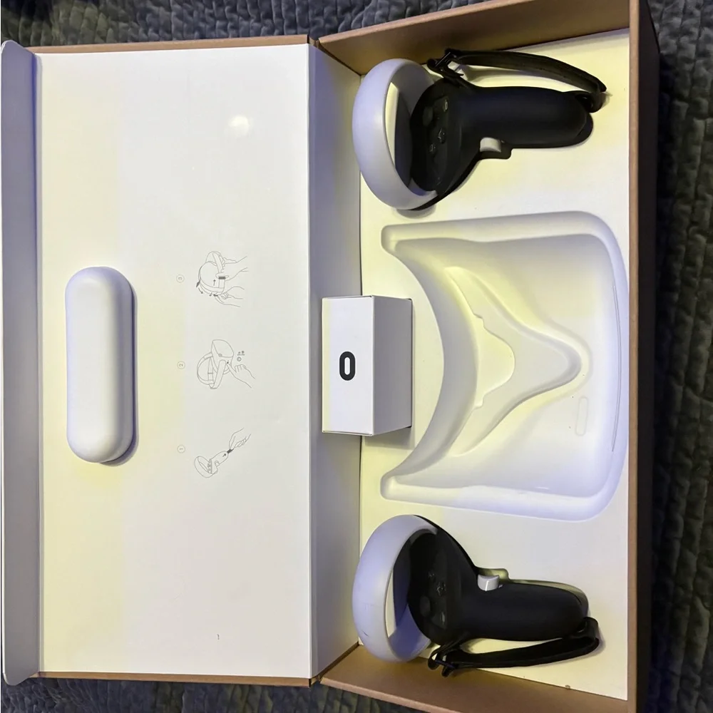 Oculus Black and White VR Controllers and Sensors