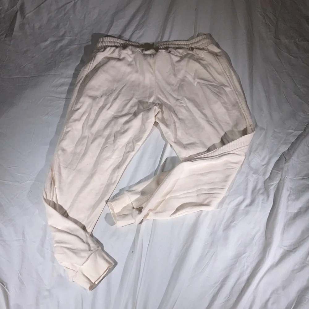 adidas worn sweatpants logo