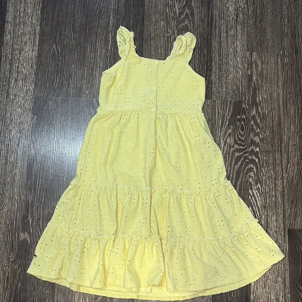 Girls bright yellow dress size 7 with buttons down the back, super cute!!