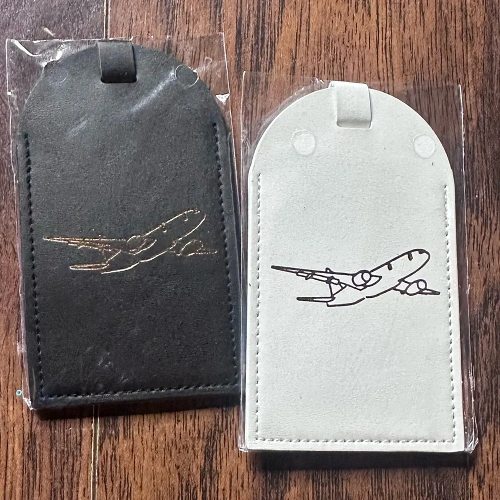 Black and White Luggage Tags with Airplane Design