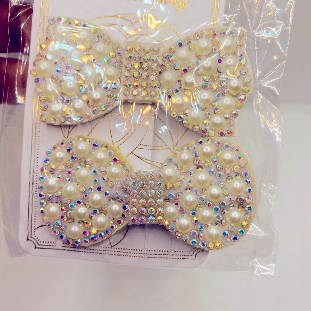 Hair barrette bow faux pearls crystals iri…