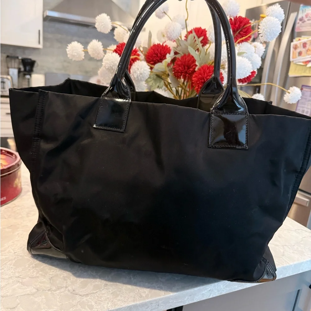 Tory Burch very good