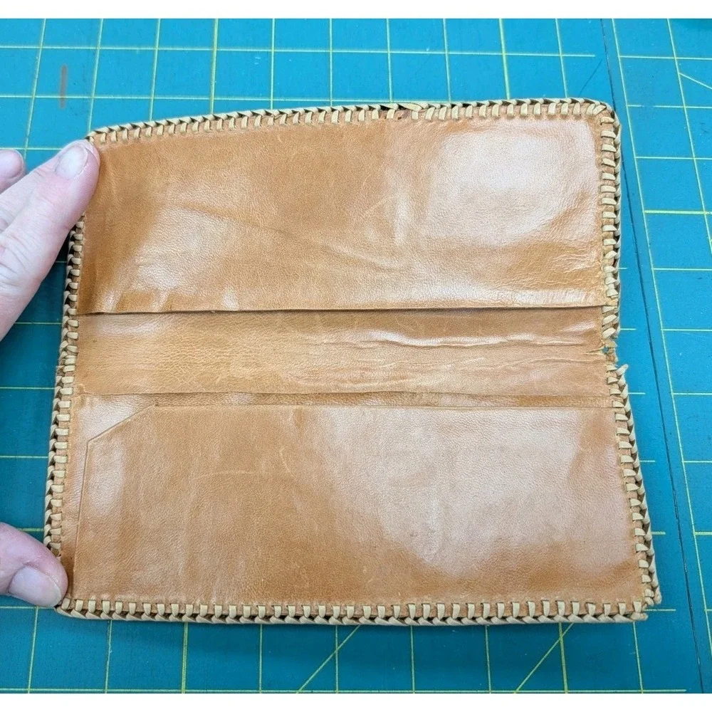 The Unbranded Brand leather tooled