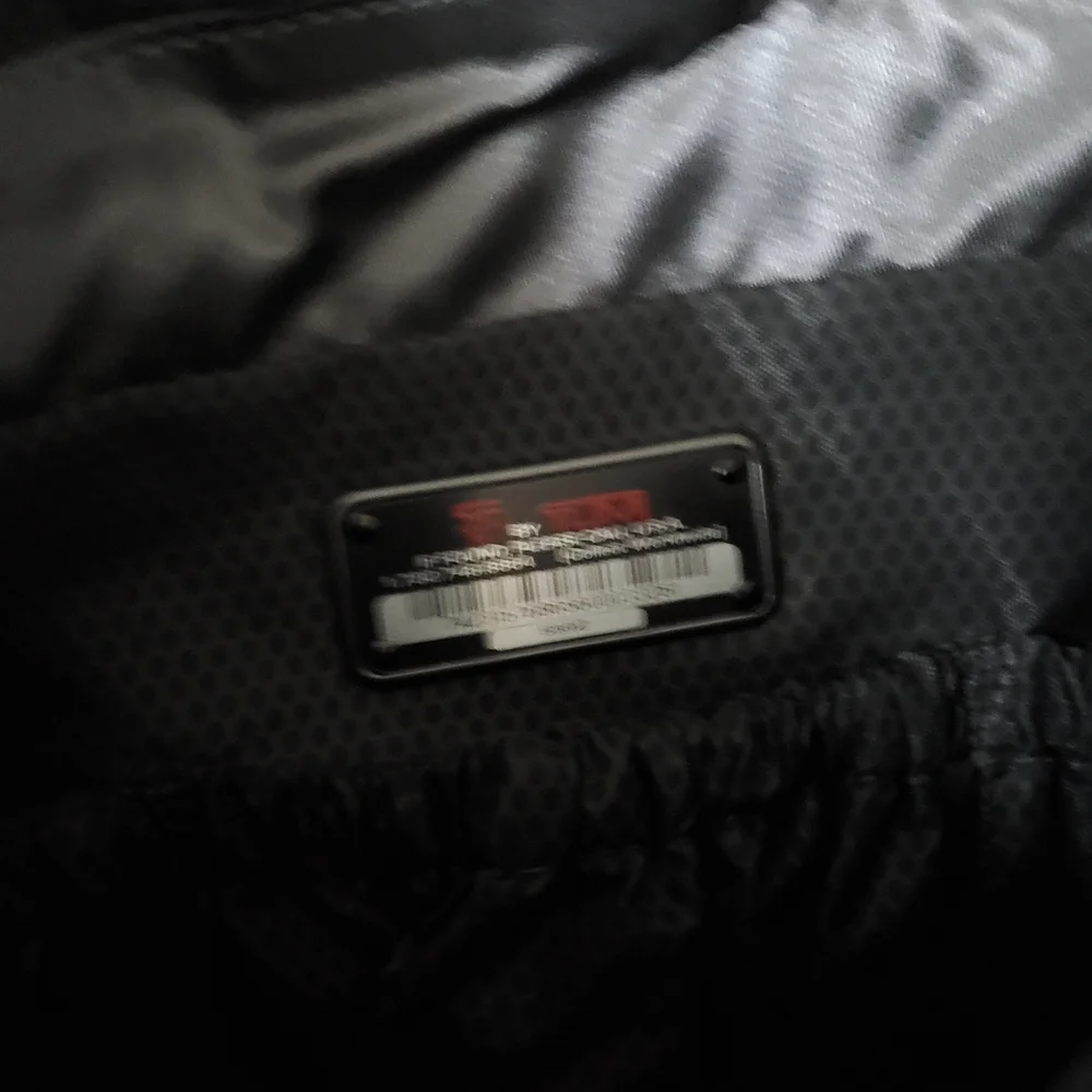 Tumi sleek accents