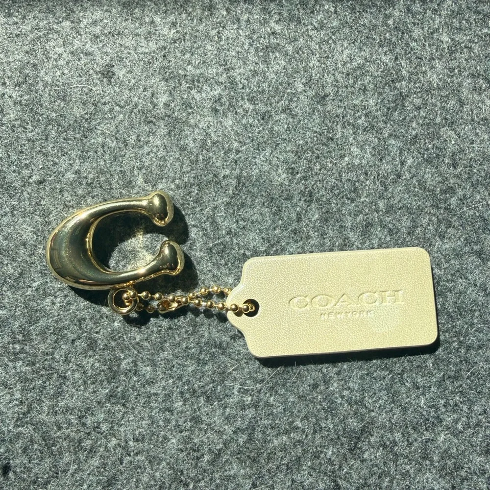 Coach New York Hang Tag Bag Charm Ivory With Gold Tone C Clasp