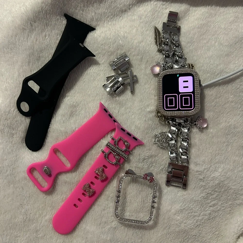 Apple Smartwatch Accessories with Pink and Black Bands and Silver Chain Bracelet