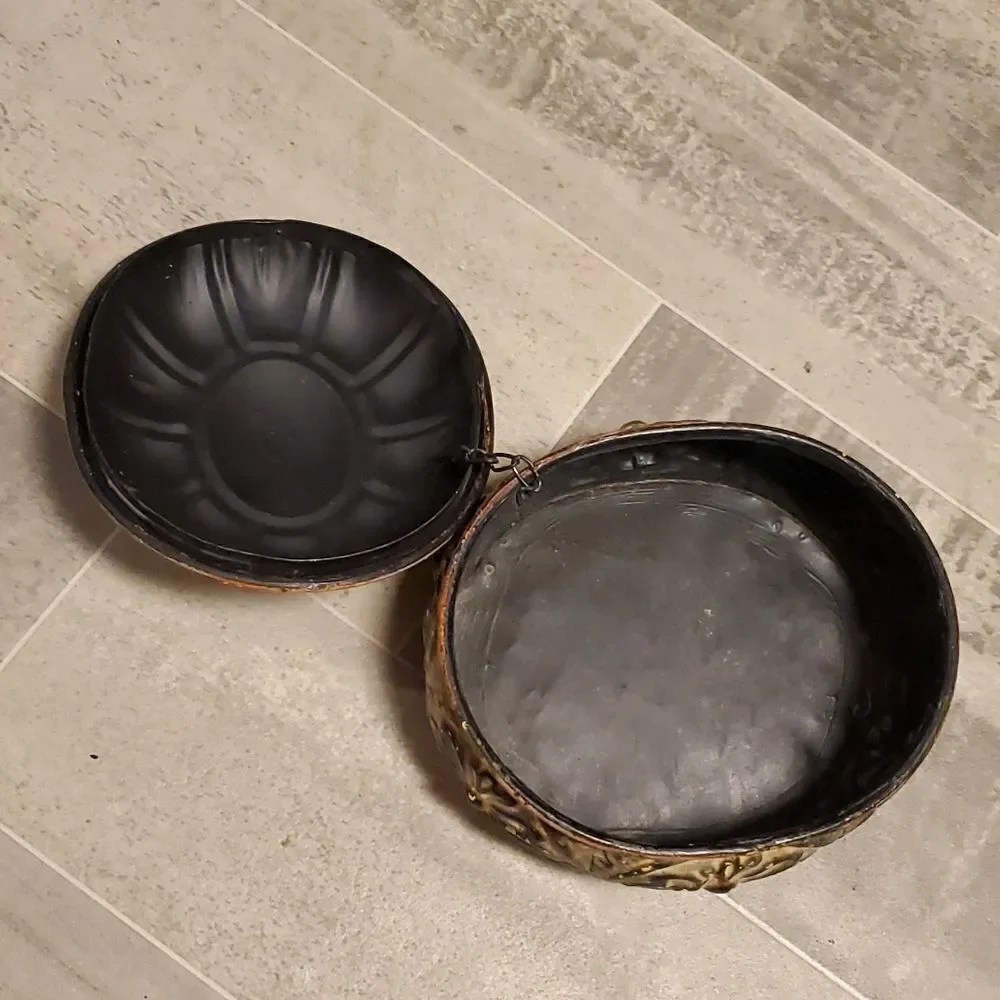 None oval metal