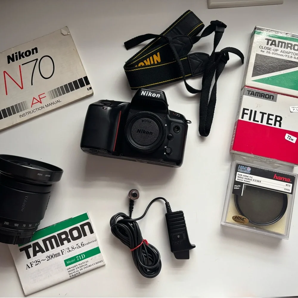 Nikon N70 SLR Camera Body with Branded Strap and Accessories