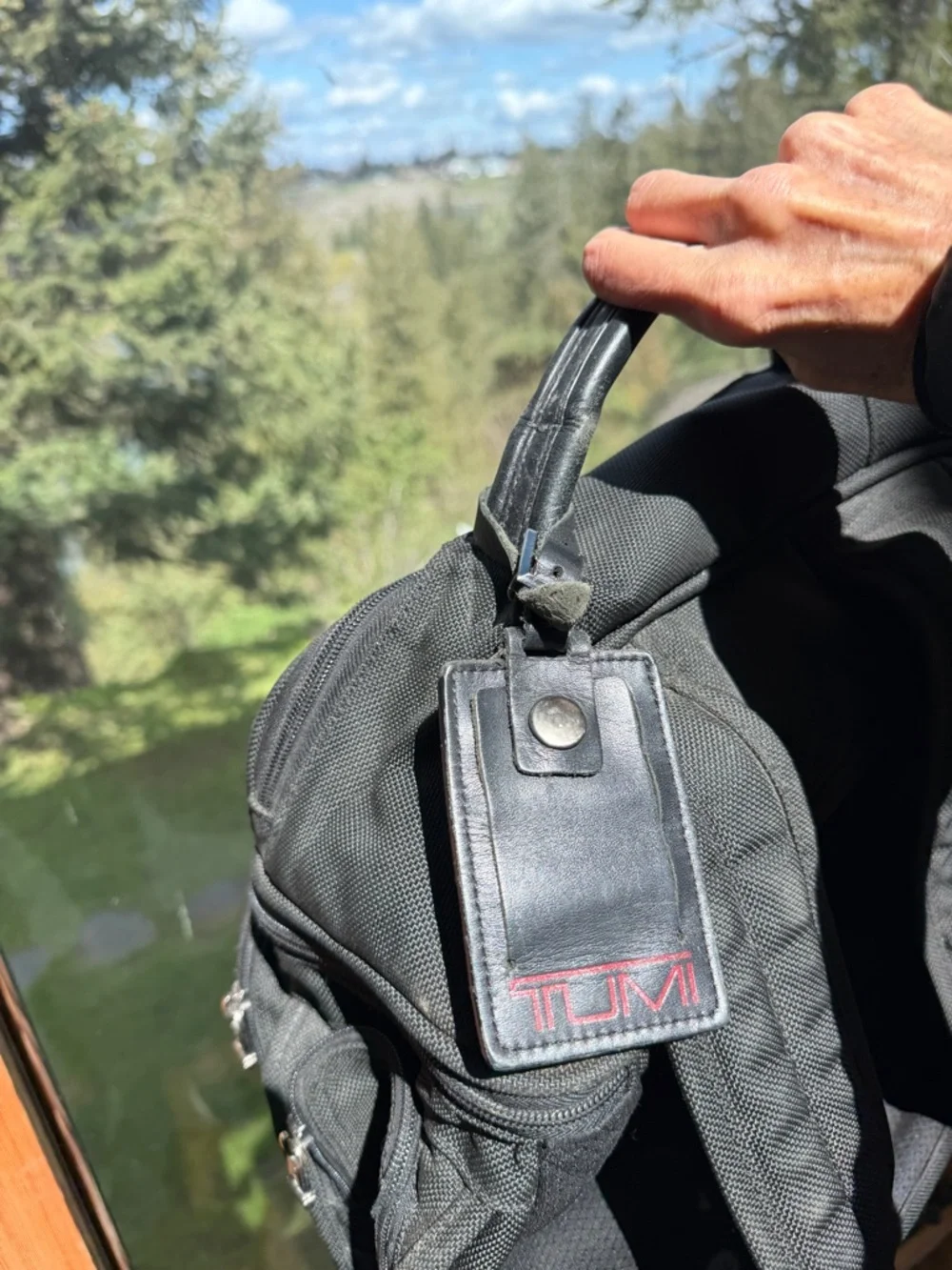 Tumi sleek backpack