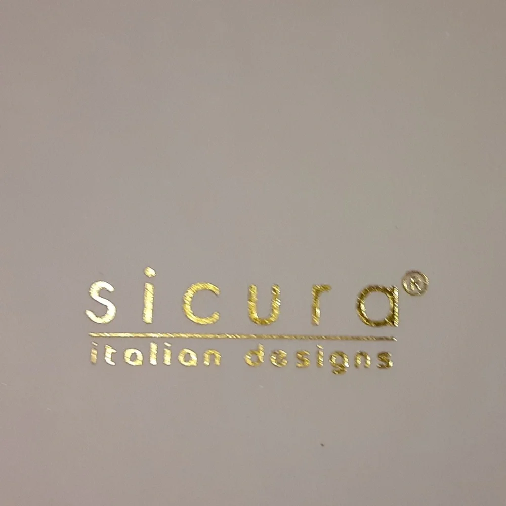 Sicura gold edged