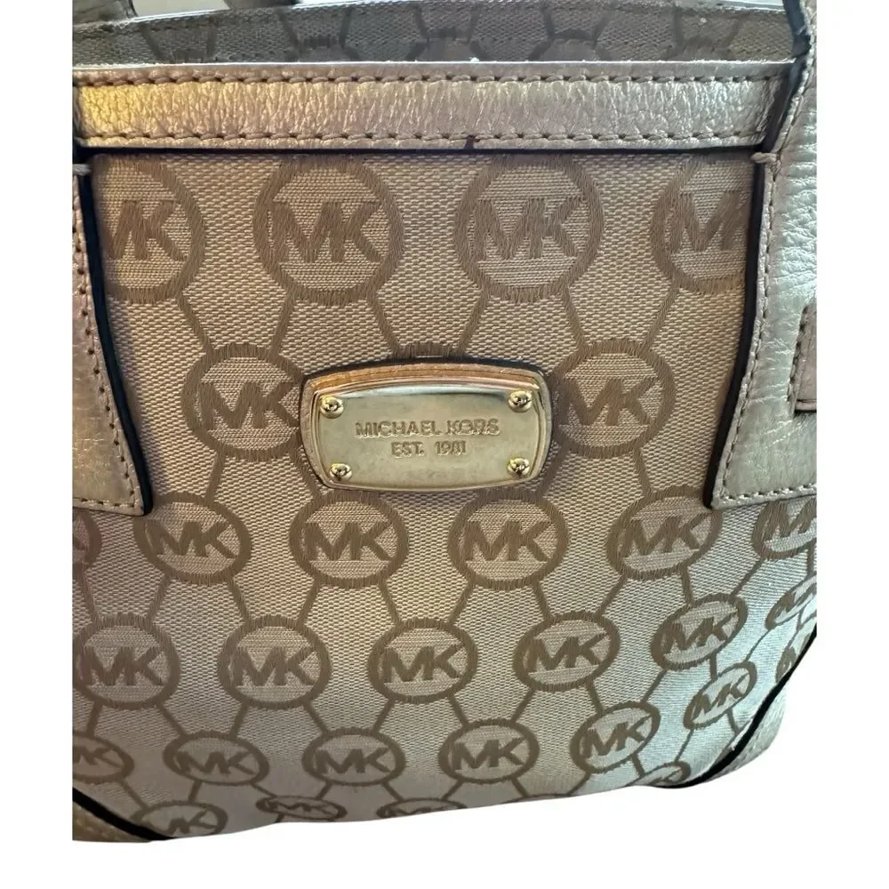 Michael Kors Small Monogrammed Leather Tote featuring the brand's signature logo