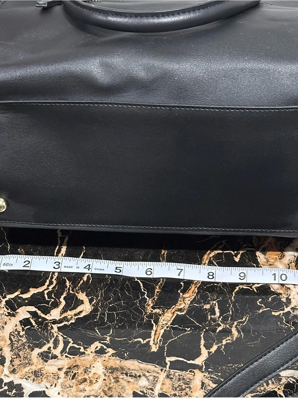 Steve Madden structured dome
