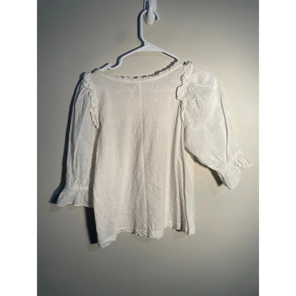 Anthropologie white puff