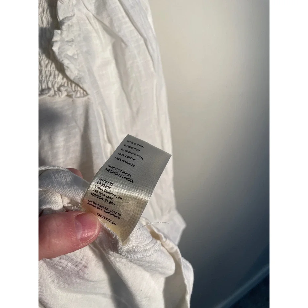 Anthropologie white puff