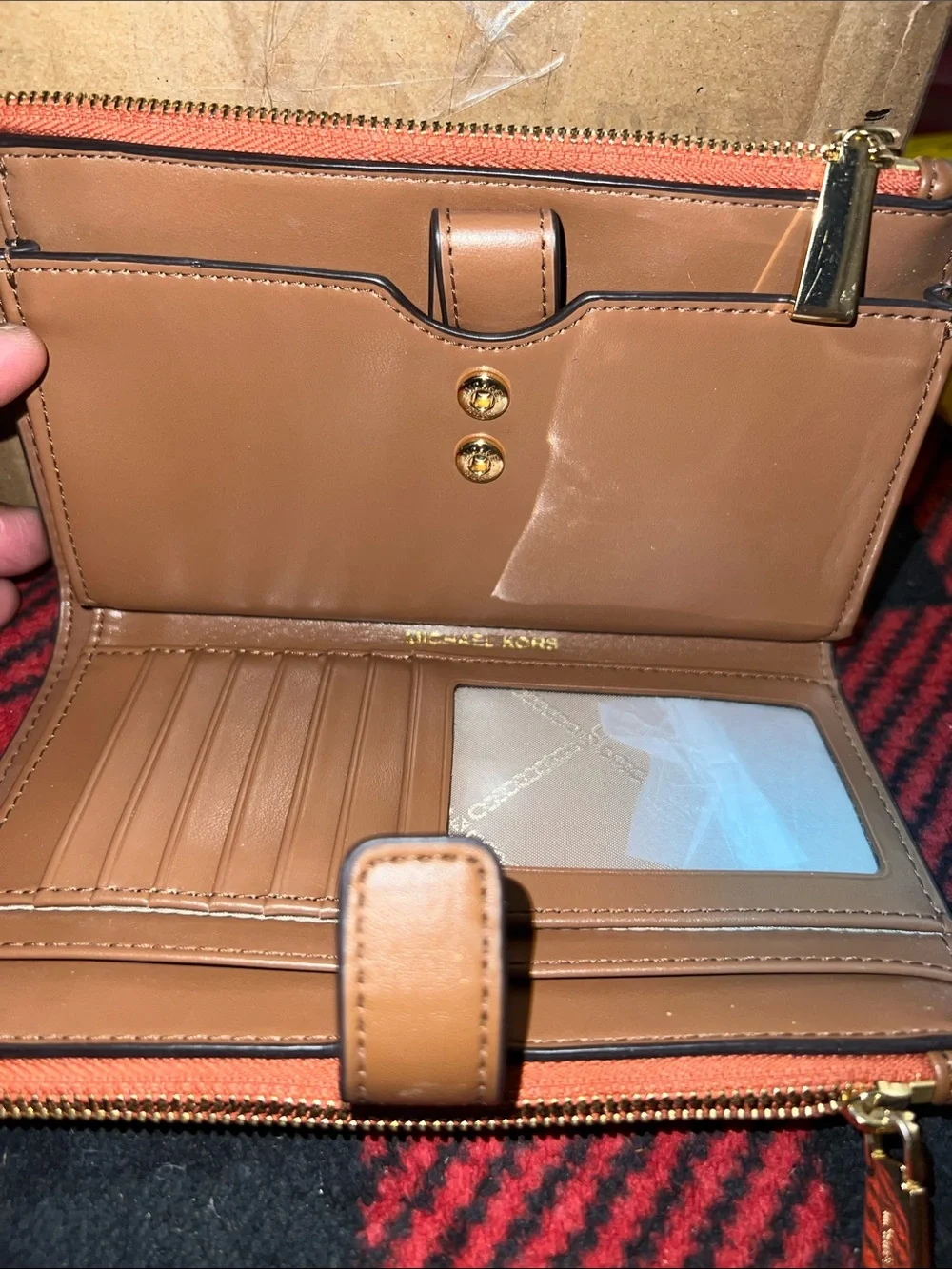 Michael Kors Orange Monogram Stripe Zip Wristlet