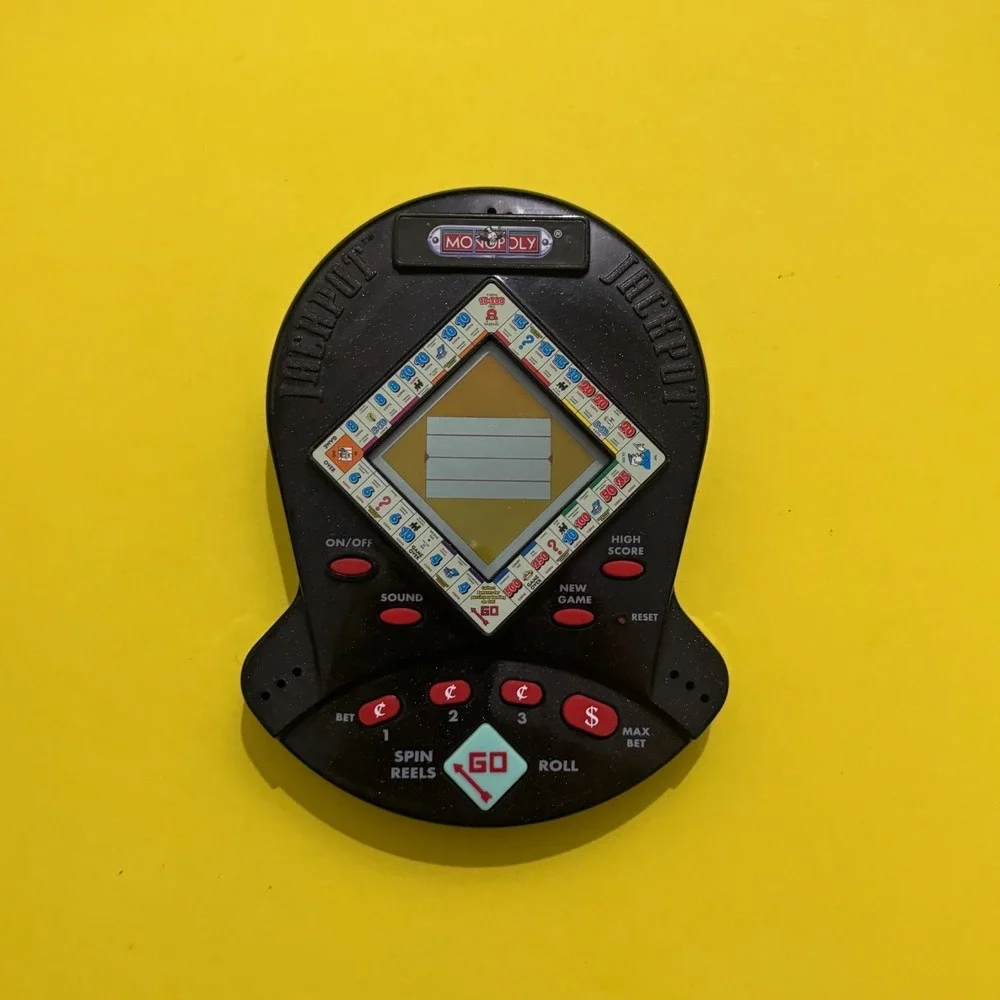 Vintage Electronic Handheld Game Bundle - Monopoly Jackpot (1999) & Poker (2004)