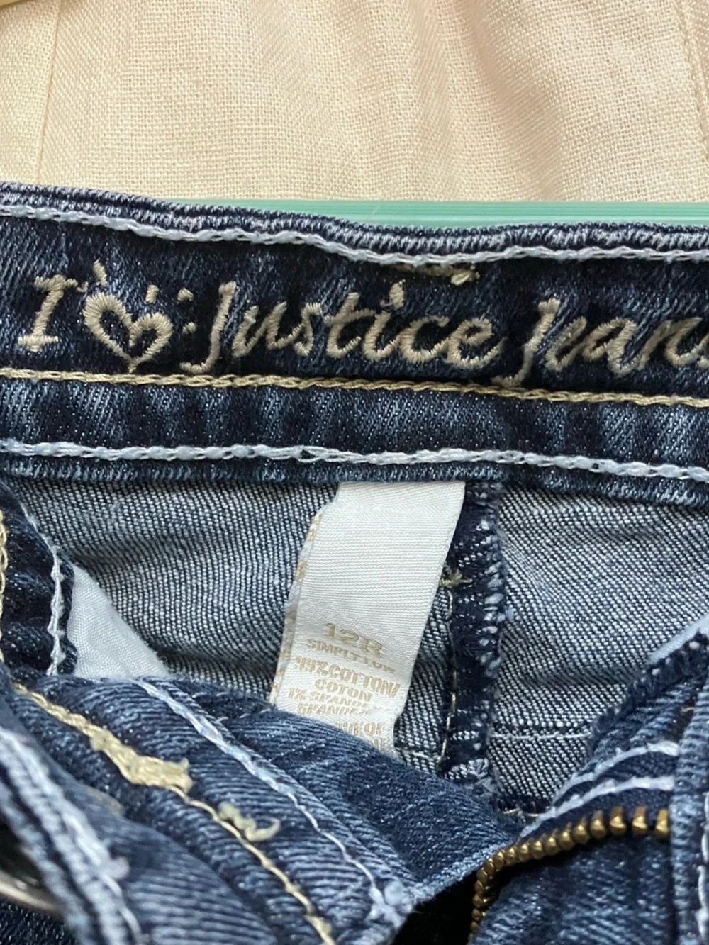 Justice button subtle tone