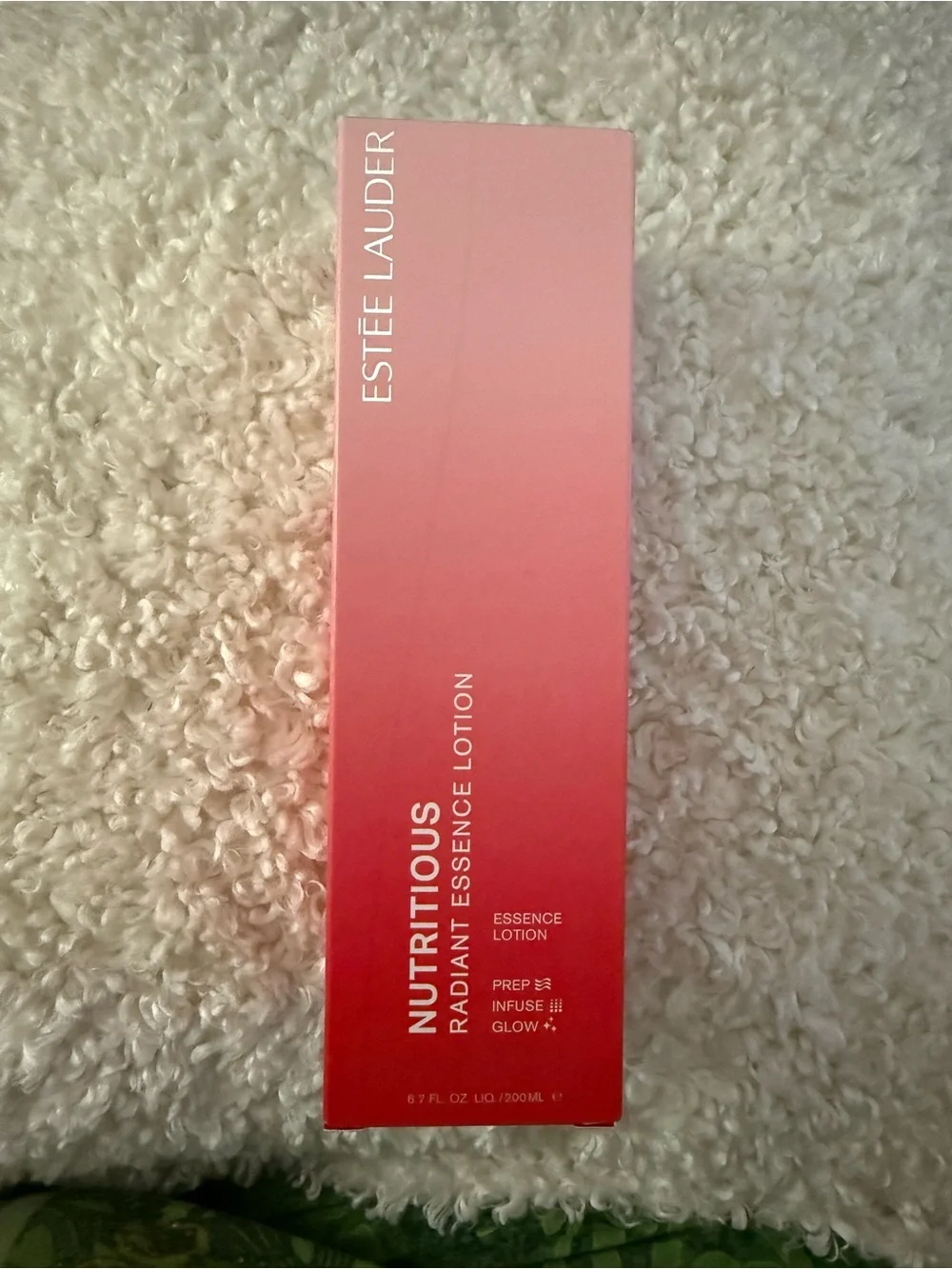 Estée Lauder Nutritious Radiant Essence Lotion - Pink to Red Ombre Box