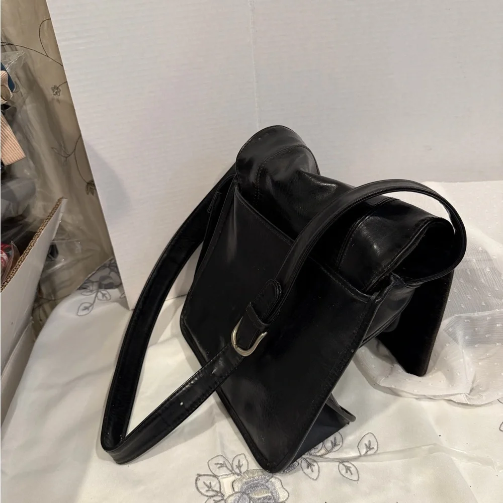 Coach sleek black