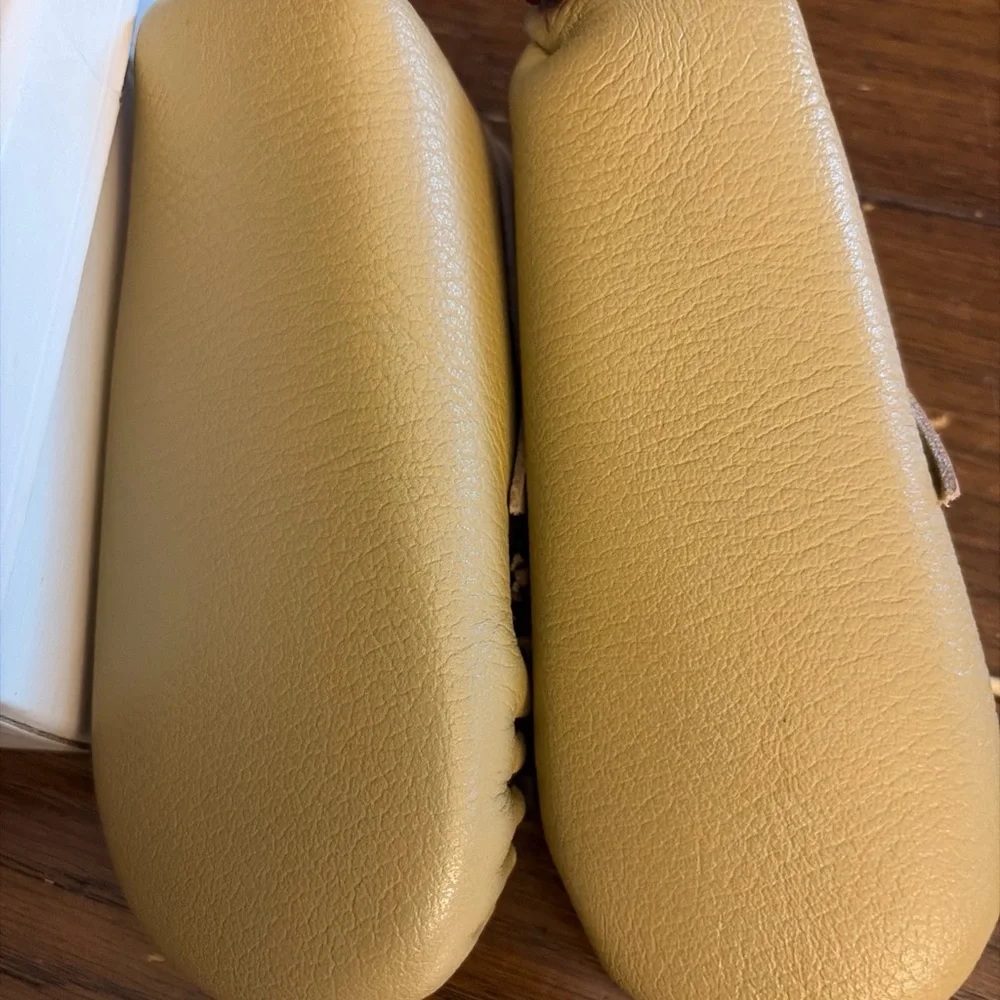 Minnetonka never worn