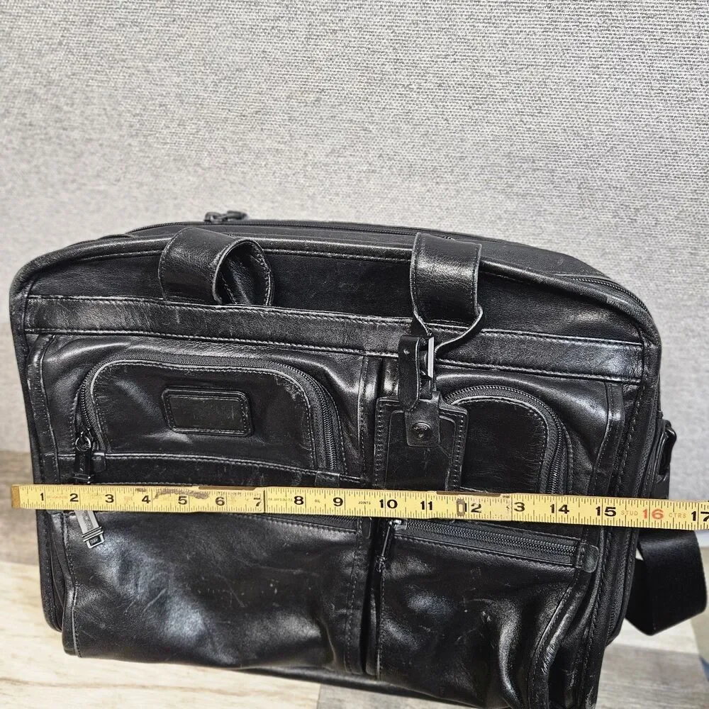 Tumi black leather