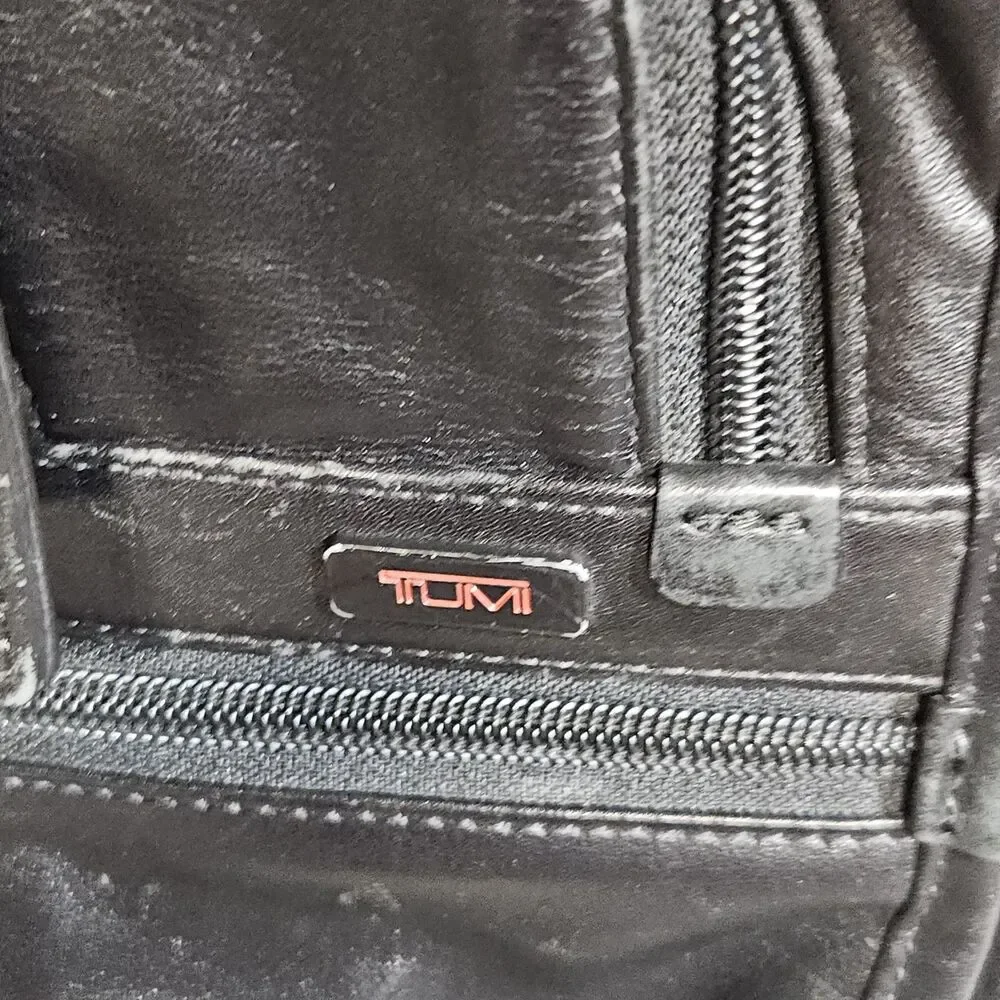 Tumi black leather