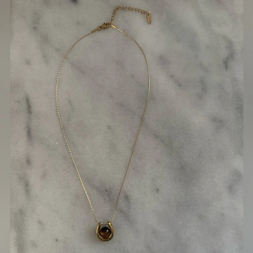 Modest Lu gold amber