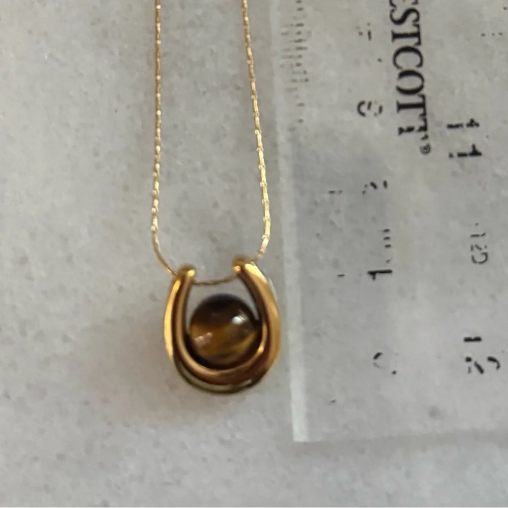 Modest Lu gold amber