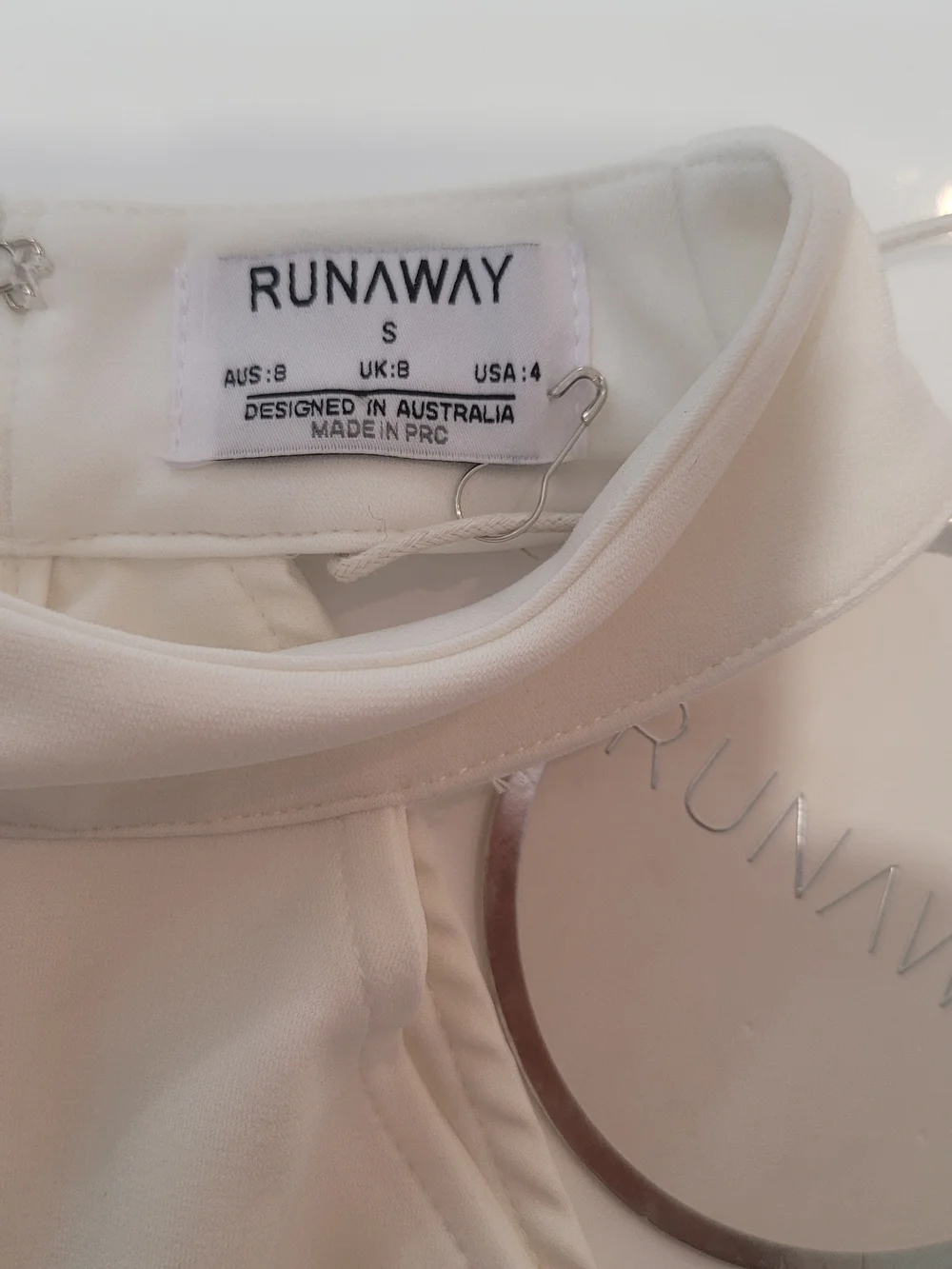 Runaway The Label sleek white