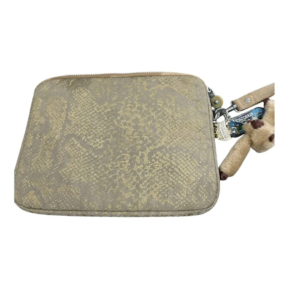 Kipling gold snakeskin