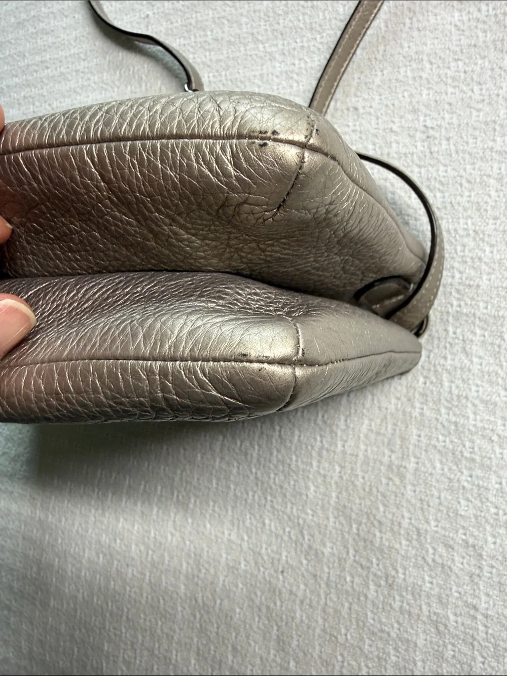 Coach embossed logo