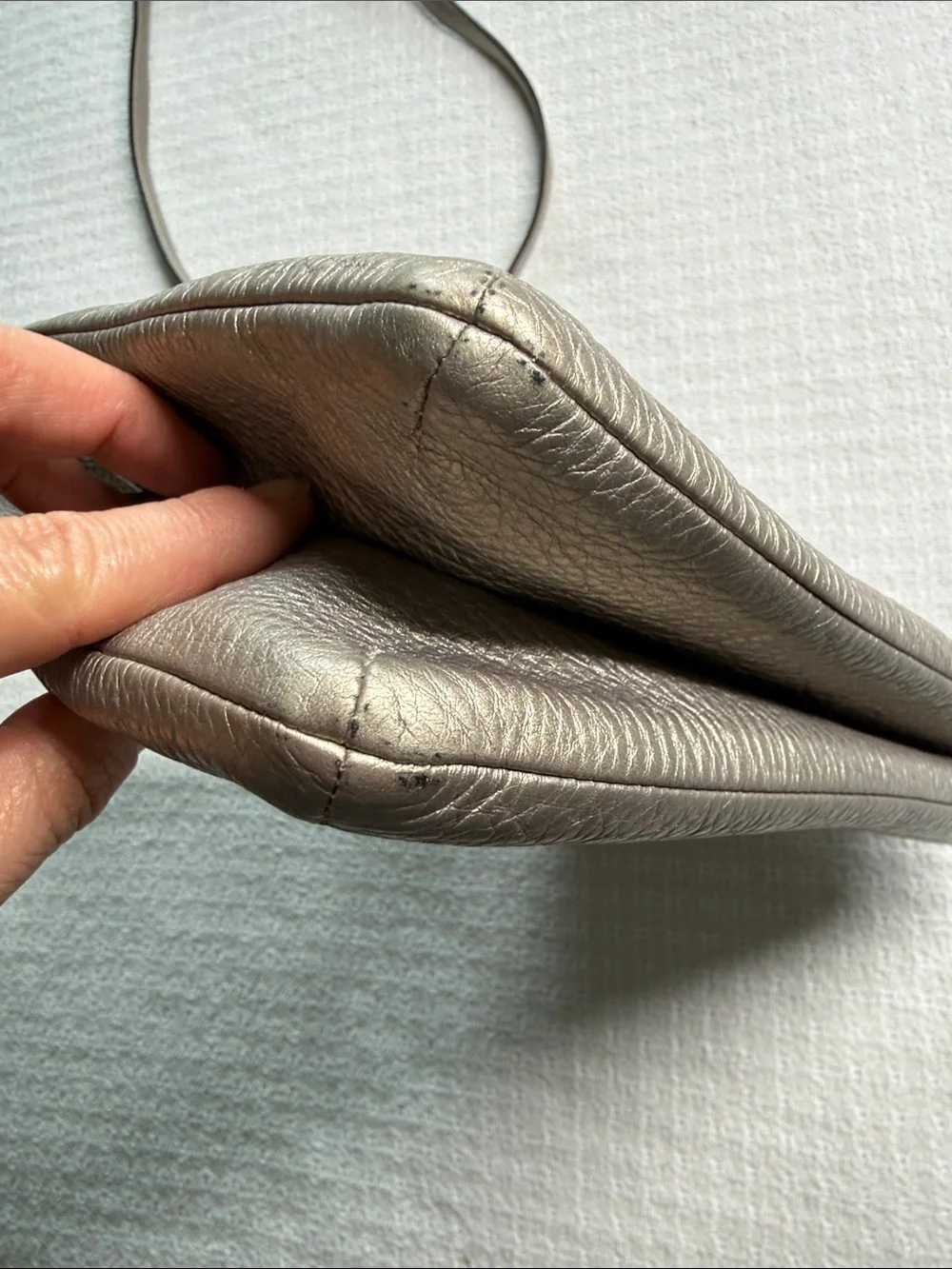 Coach embossed logo