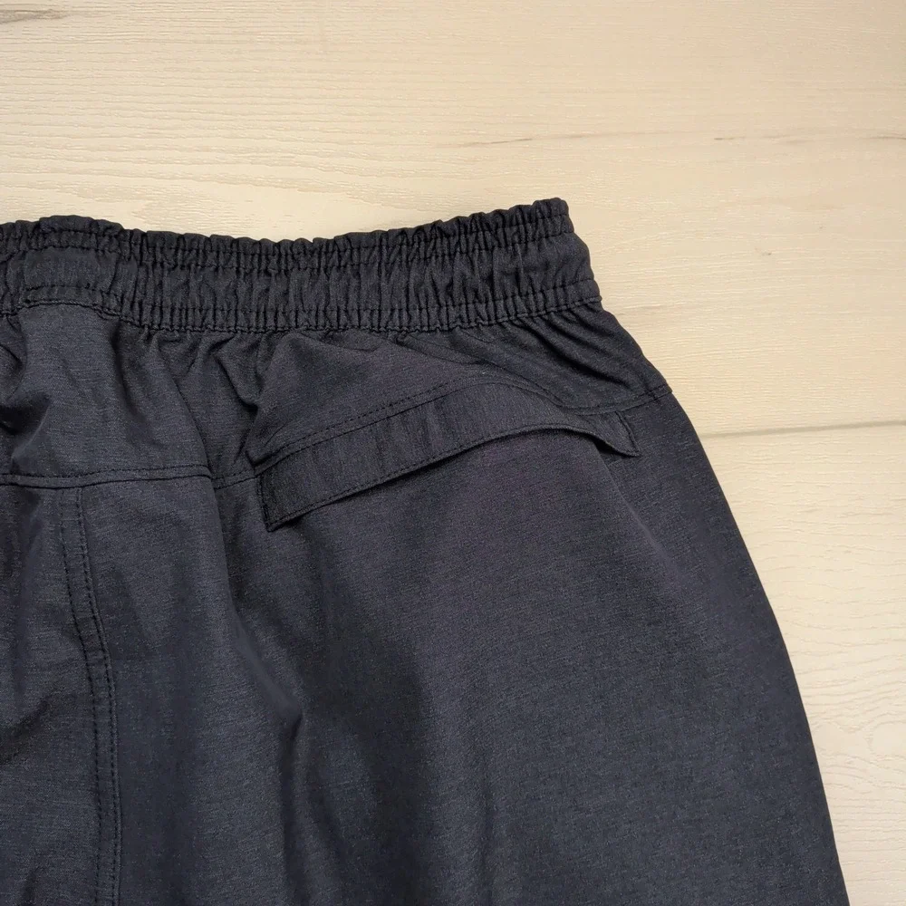 Travis Mathew size tag