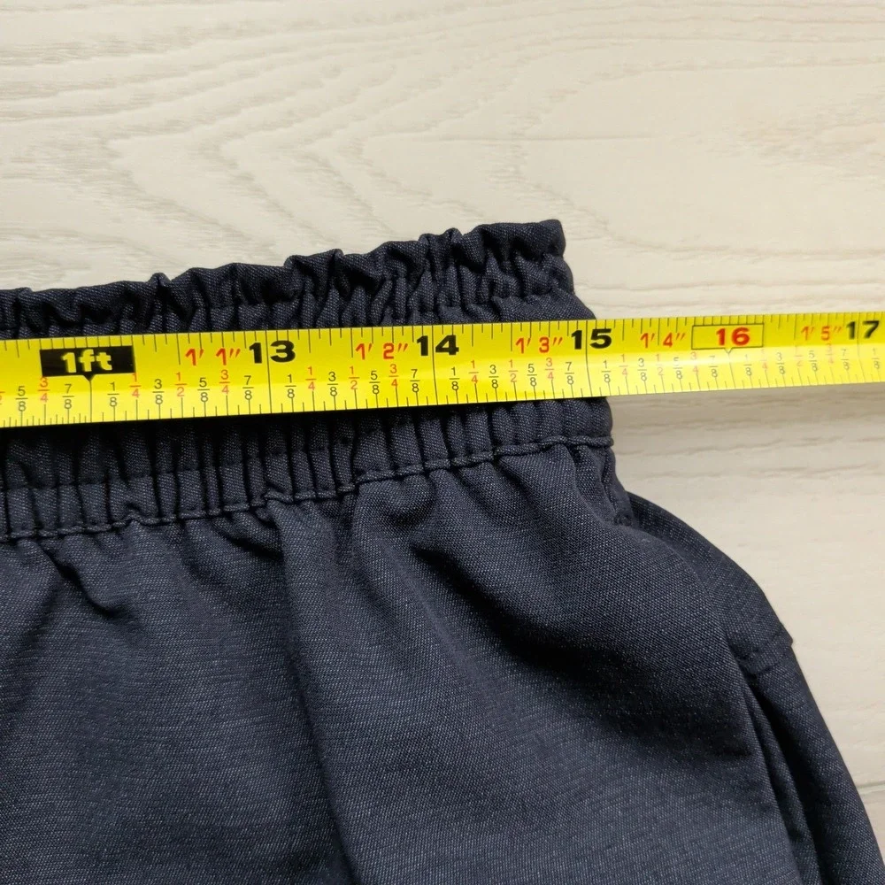 Travis Mathew size tag