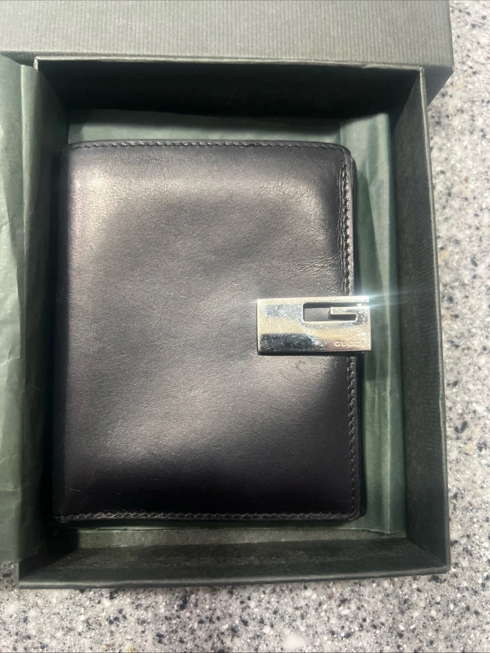 Gucci Black Leather Bifold Card Holder with Silver G-Clip Accent