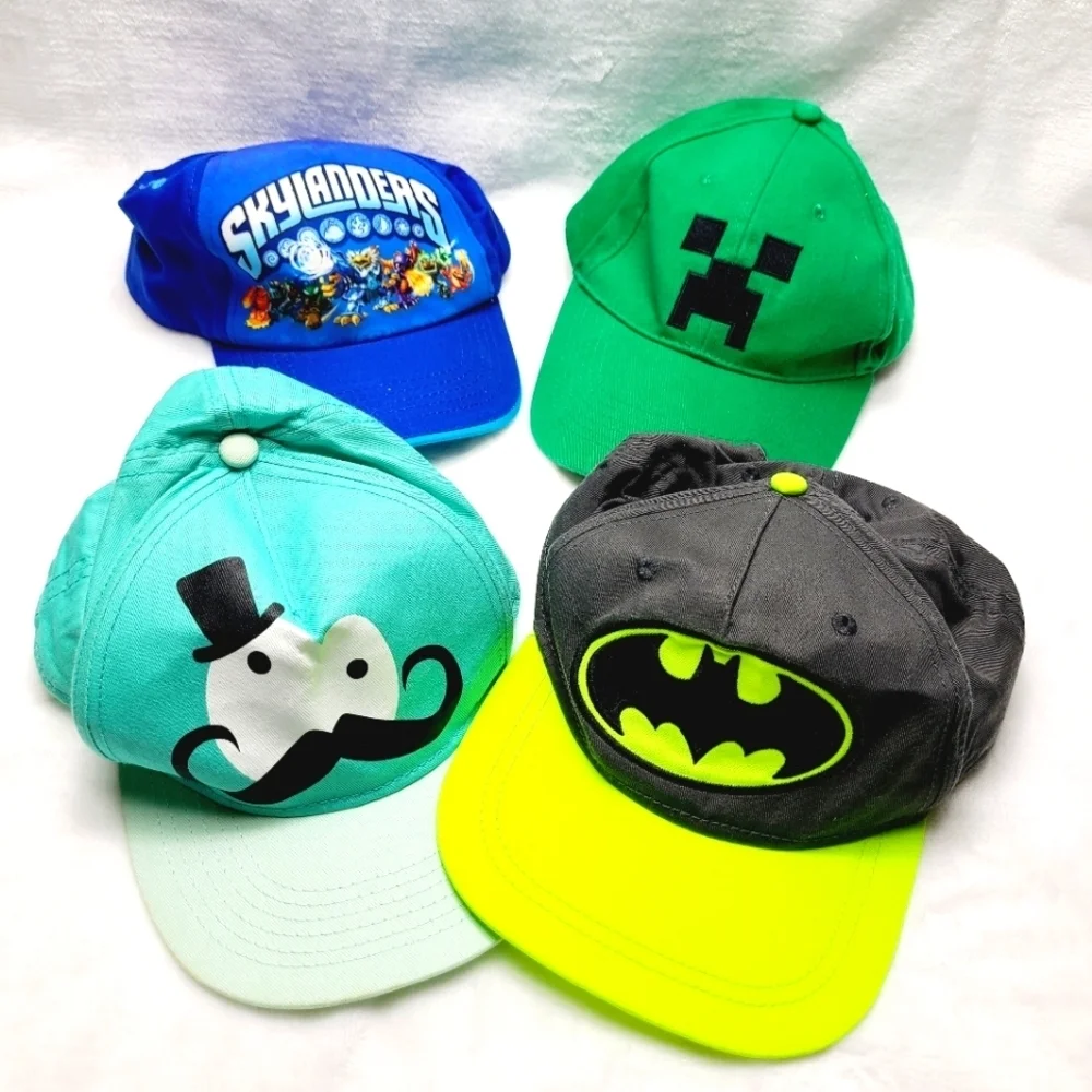 4 X bundle of hats jinx, skilanders,batman( one size) , h&m(4-6)