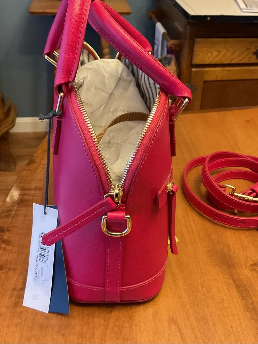 Dooney & Bourke compact dome