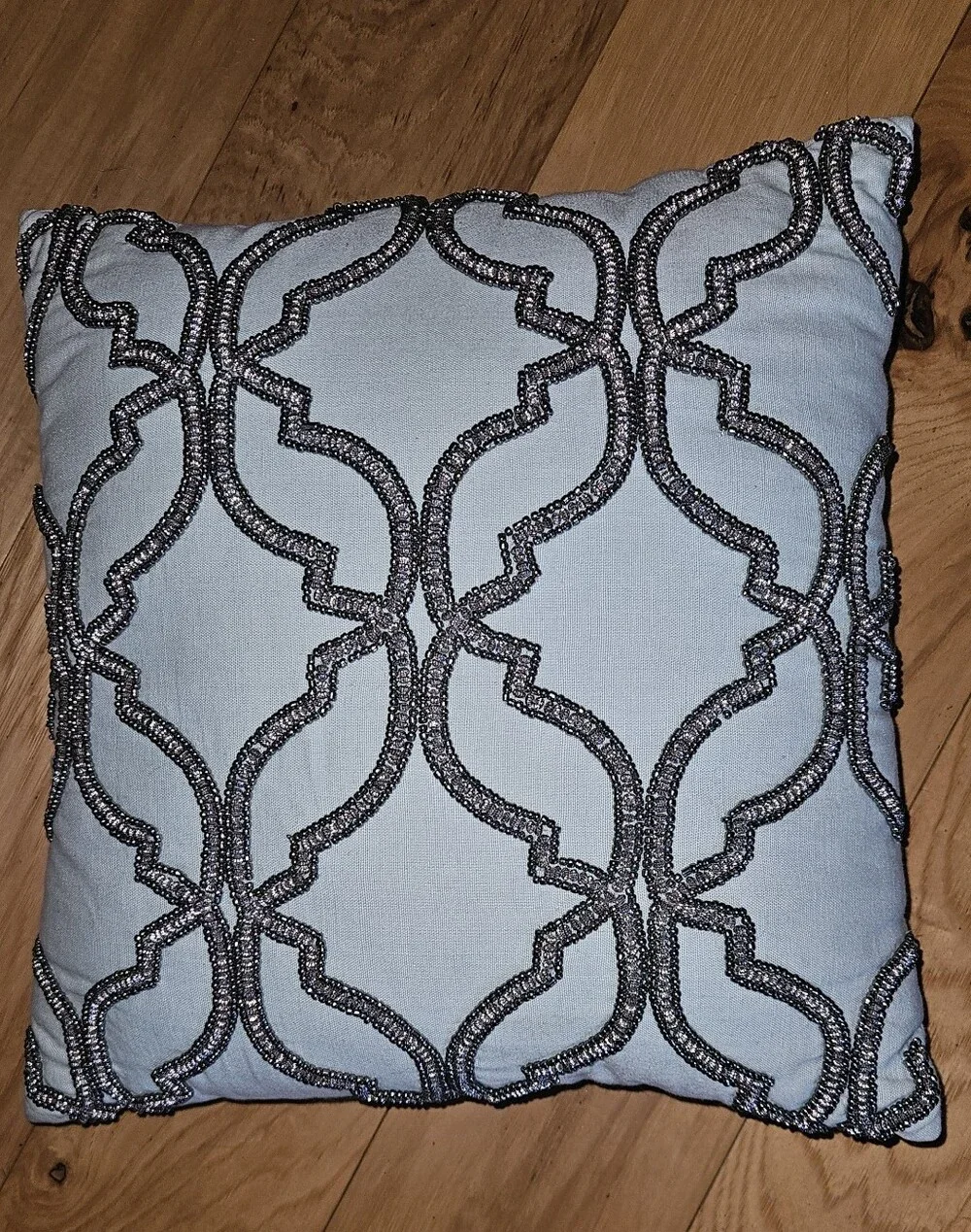 Decorative Light Blue Throw Pillow with Silver Beaded Pattern