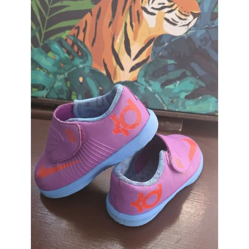 Nike KD Kids Purple Slip-On Sneakers with Orange Swoosh and Light Blue Sole