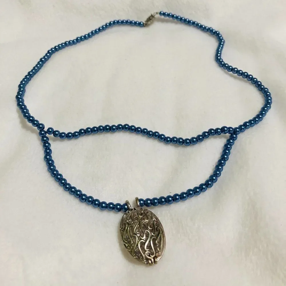 None silver oval