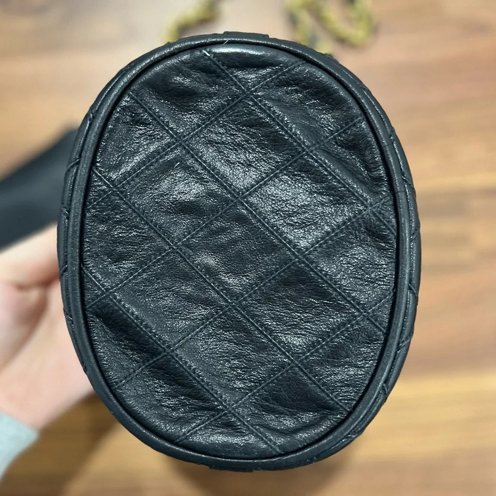CHANEL Black Quilted Leather Drawstring Bucket Bag with Gold Hardware