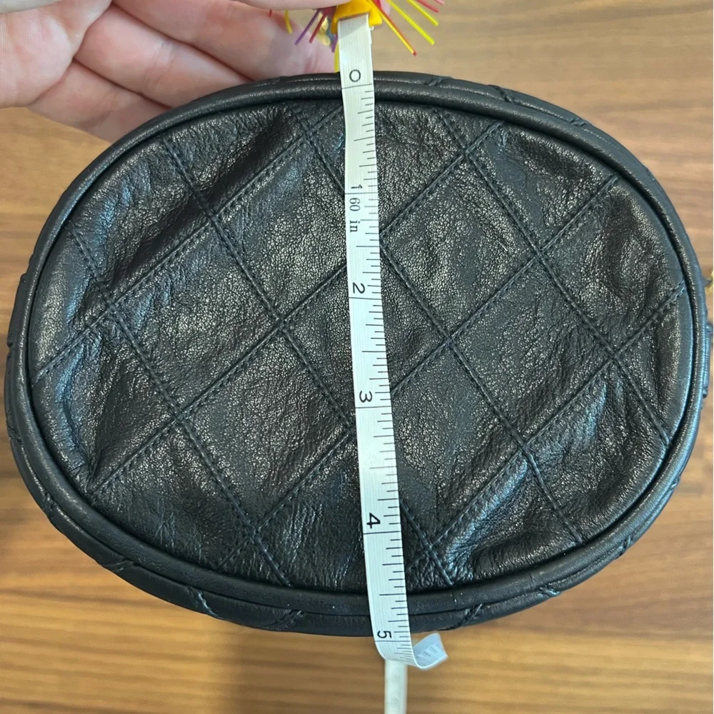 CHANEL Black Quilted Leather Drawstring Bucket Bag with Gold Hardware